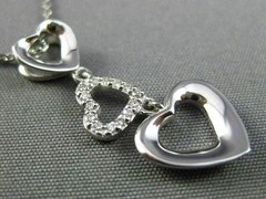 ESTATE .06CT DIAMOND 14KT WHITE GOLD 3D OPEN TRIPLE HEART FLOATING LOVE PENDANT