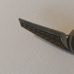 Stoffel Seals Signed Wing Brooch Pin Gold Tone Green Round Bezel Center