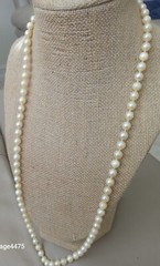 Vtg Cultured Natural Ivory Pearl Individualy Knotted Opera Lenth Pearl Necklace