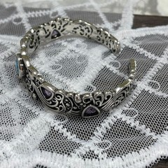 Openwork carved blue topaz bracelet for women, vintage style.