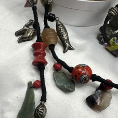 Vtg Indian Glass Beads Stone Nuggets and Seven Puffed Animals Cord Necklace.Read