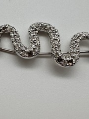 Vintage Swarovski Swan Silver tone Pave Crystal Snake brooch green eyes