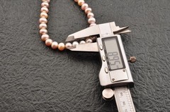 Off-round shape freshwater pearls necklace (440mm(17.3in) 212.5ct) “GEM REPORT”.