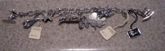 VINTAGE 1960’s ‘JEWELART’ STERLING SILVER 7 INCH CHARM BRACELET (8 CHARMS)