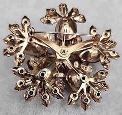 Vintage gold-toned Brooch featuring Ruby Red Navette and round Aurora Borealis
