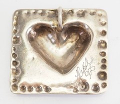 One of a kind artisan sterling silver heart relief modern pendant by Alissa