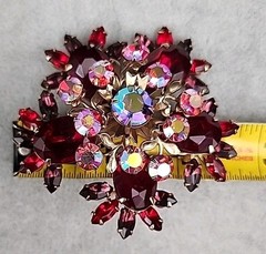 Vintage gold-toned Brooch featuring Ruby Red Navette and round Aurora Borealis