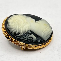 Gold Tone Cameo Brooch Oval Blue background – 1 5/8″ x 1 3/8″