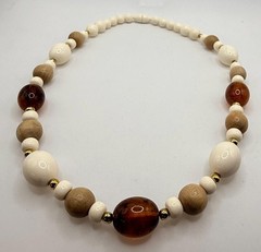 Vintage off white light wood and brown marbled amber colored beaded necklace