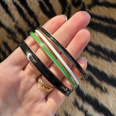 S Set of 4 Vintage Metal and Black, White, and Green Enamel Bangle Bracelets