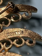 Vintage Monet Gold Tone Textured Peacock Filigree Brooch