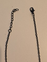 vintage-style beaded necklace black faceted beads and silver-toned spacers.