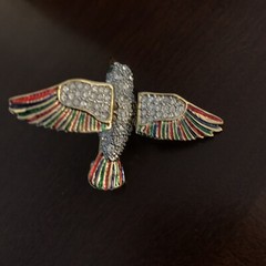 Gold tone colorful bird pin with rhinestones and moveable wings