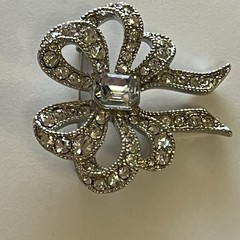 Vintage Monet Clear Rhinestones Bow Brooch Silver Tone Emerald Cut Center Stone