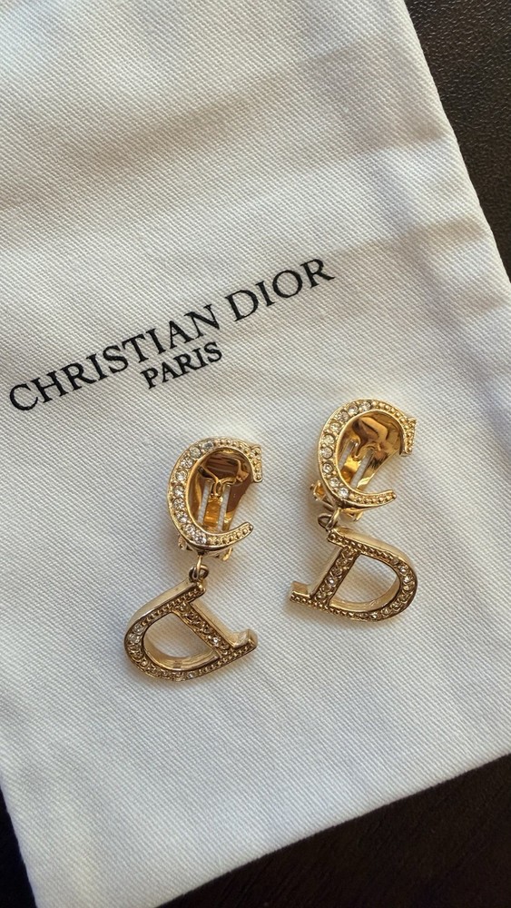 Authentic Christian Dior monogram logo clip-on earrings from the 1990s – Gold