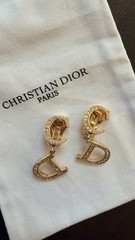 Authentic Christian Dior monogram logo clip-on earrings from the 1990s – Gold