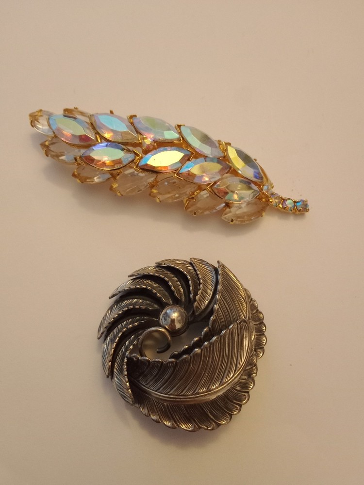 2 Brooches Silver Tone Botticelli And Gold Tone AB Stone Leaf