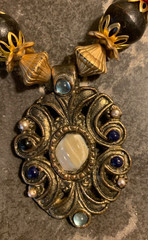 tribal chunky goldtone metal pendant, wood beads 12″ drop hook/eye fastener