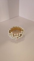 Elegant vintage-style pearl cluster expansion bracelet.