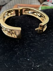 gold tone elephant hinged bracelet Trunks Up Green Eyes Unsigned