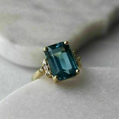 3Ct Emerald Cut Lab Created Blue Topaz & Diamond Ring In 14K Yellow Gold Plated