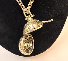 Filigree Aromatherapy Diffuser Necklace.