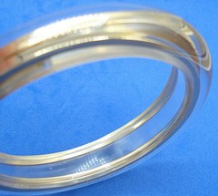 VINTAGE BCBG MAXAZRIA ASYMMETRICAL BANGLE BRACELET CLEAR GOLD TONE BANDS INSIDE