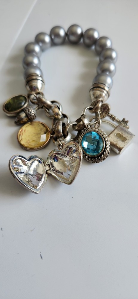 Vintage Avon Multiple Charm Silvertone Stretchable Locket Bracelet 8+