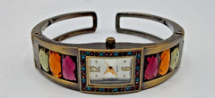 “Vintage” Quartz Spring, Ladies Gold Tone Jeweled Cuff Bracelet Analog Watch.