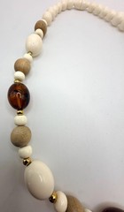 Vintage off white light wood and brown marbled amber colored beaded necklace