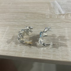 Vintage Judy Lee rhinestone and blue aurora borealis moon glow clip on earrings