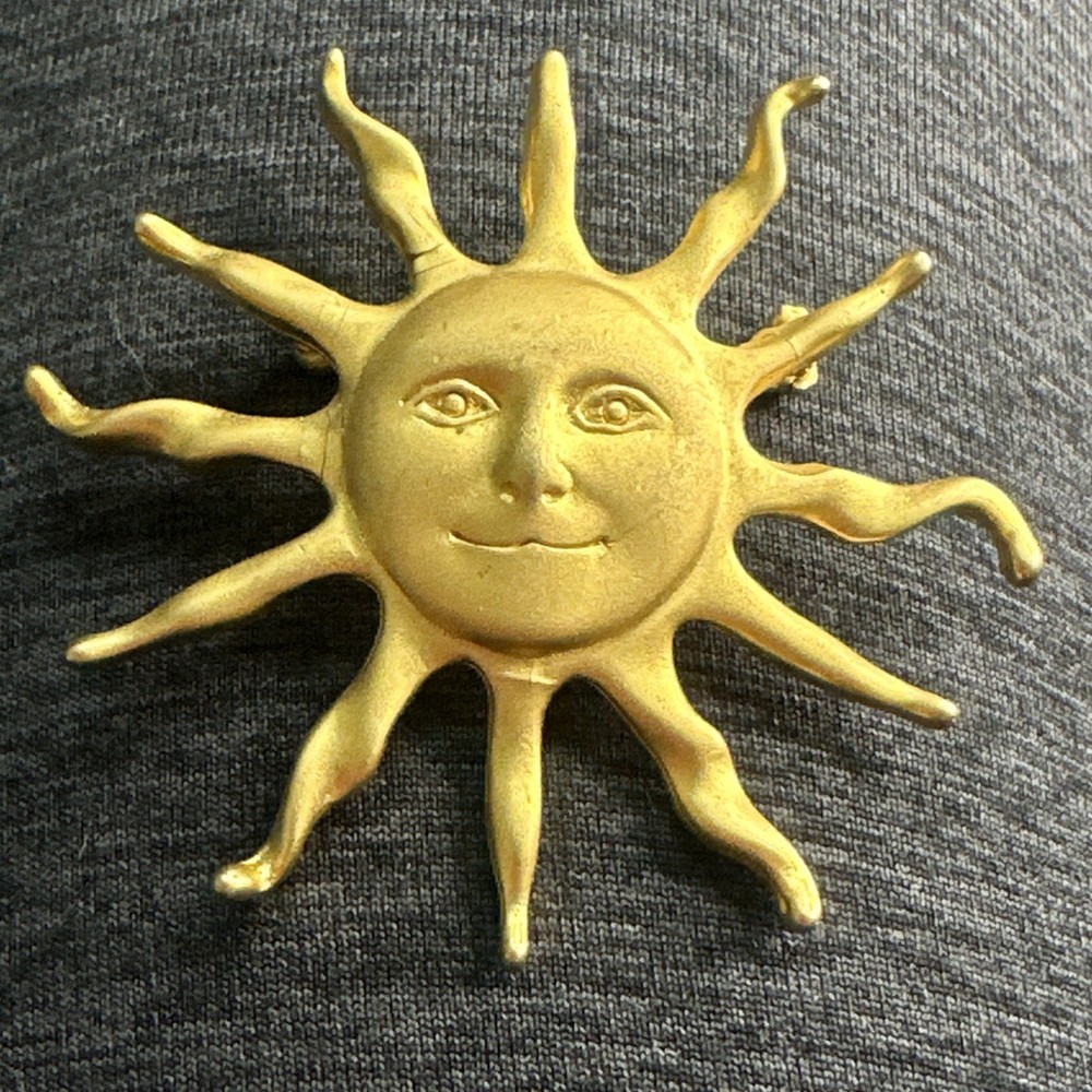 L R ~ Lady Remington signed Vintage Sunshine brooch