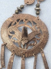 A set of tribal-style wooden and metal jewelry pendant necklace 26in Earrings.