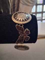 Mexican alpaca silvertone butterfly & Aztec sun medallion bracelet. 7″