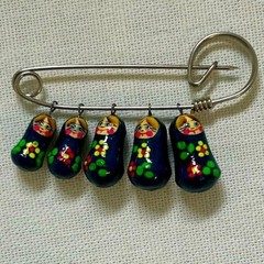 Authentic Russian matryoshka doll pin hand painted in Russia navy blue.
