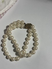 Woman’s Double Strand Pearl Bracelet Measuring 7 Inches Square Clasp Looks Gold