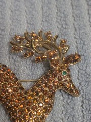 Nolan Miller Christmas Gold Tone Reindeer Brooch with Rhinestones