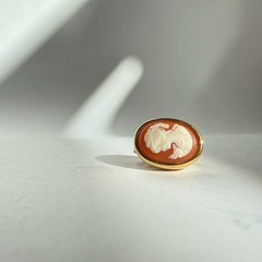 Vintage CROWN TRIFARI 1960s Gold Toned Orange and Ivory Cameo Clip On Earrings