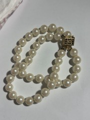 Woman’s Double Strand Pearl Bracelet Measuring 7 Inches Square Clasp Looks Gold