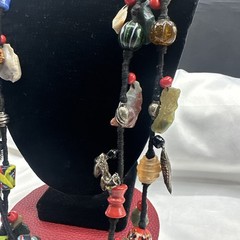 Vtg Indian Glass Beads Stone Nuggets and Seven Puffed Animals Cord Necklace.Read