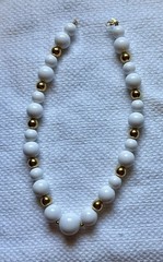 Vintage “MONET” gold-tone and white beaded necklace with gold tone spacers