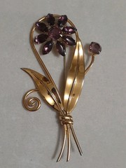 Sterling silver gold plated prong set purple glass flower & stem leaf brooch