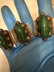 vintage sterling silver bracelet features marquise-cut green onyx stones bezel-s