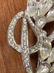 vintage rhinestone floral spray brooch, similar to designs from the 1940s-1950s