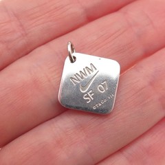 Tiffany & Co. Sterling Silver Vintage Nike Women’s Marathon 2007 Mini Pendant