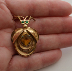 Unique unsigned art deco figural green eyed rhinestone bug fur clip brooch