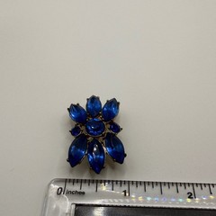 Vintage Sapphire Blue Rhinestone Floral Brooch Gold Tone Mid Century Sunburst