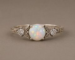 Handcrafted White Ethiopian Opal Ring with Moissanite Accents & Vintage Leaf