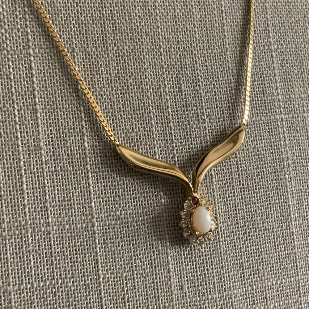 Vintage man made low grade opal and garnet v necklace in gold tone