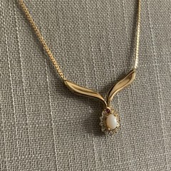 Vintage man made low grade opal and garnet v necklace in gold tone